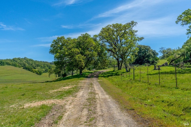 view of road featuring a rural view