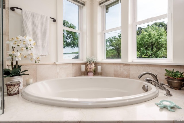 bathroom featuring a garden tub