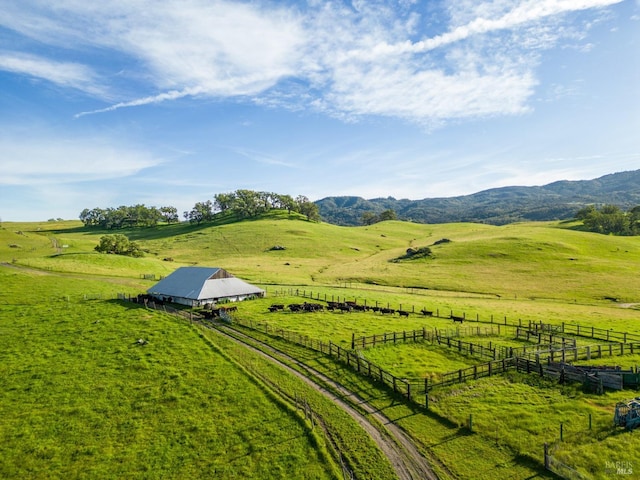 bird's eye view with a rural view and a mountain view