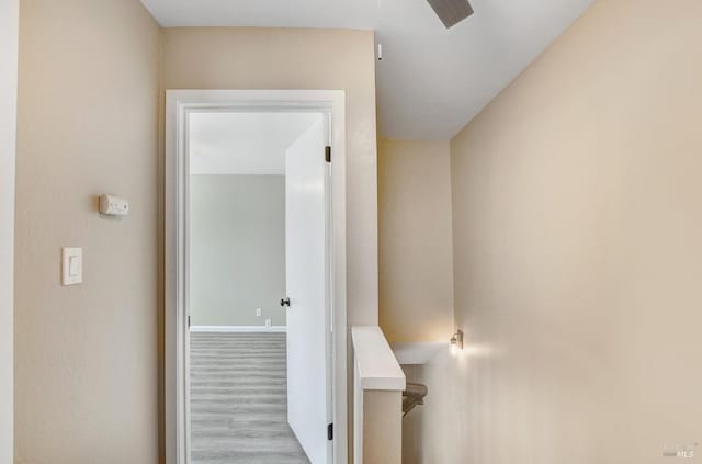 corridor with wood finished floors