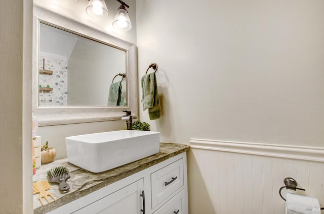 bathroom featuring vanity and wainscoting