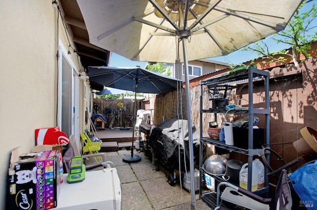 view of patio with fence