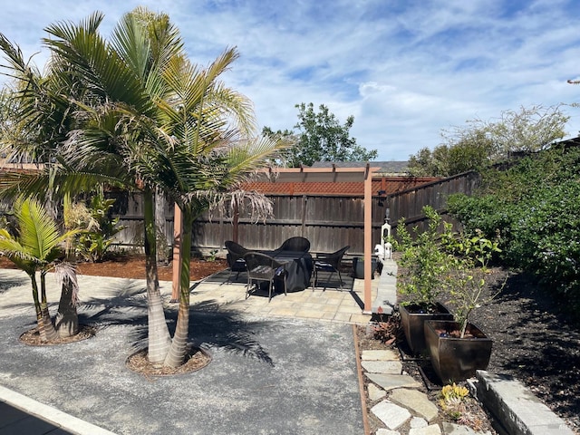 view of patio with fence