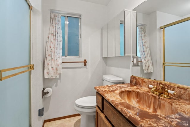 26228 Otter Dr, Willits, CA 95490 - bathroom featuring toilet, vanity, and baseboards