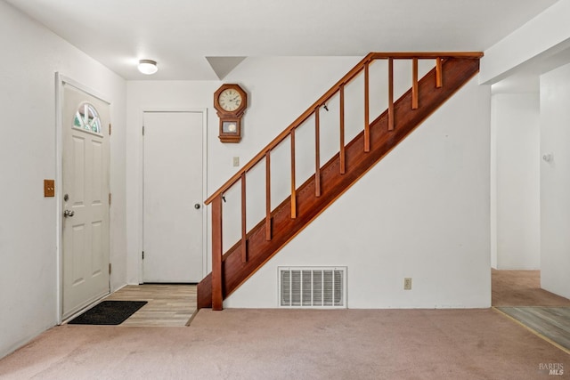 26228 Otter Dr, Willits, CA 95490 - entryway with visible vents, stairway, and carpet flooring