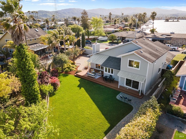 drone / aerial view featuring a mountain view and a residential view