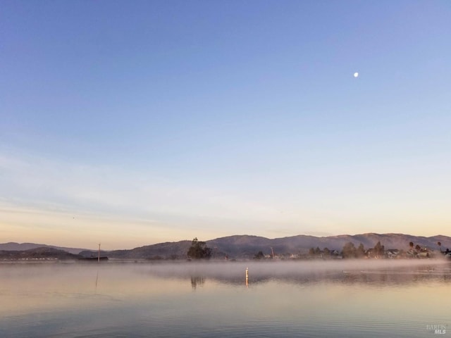 property view of water featuring a mountain view