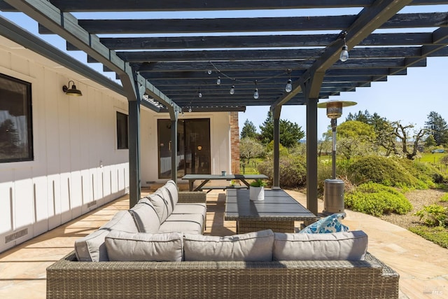 view of patio / terrace with outdoor lounge area and a pergola