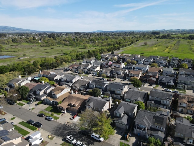 aerial view featuring a residential view and a water view