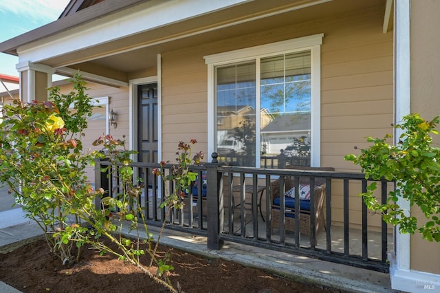 doorway to property with covered porch