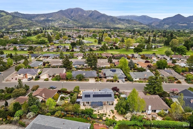 aerial view with a mountain view and a residential view