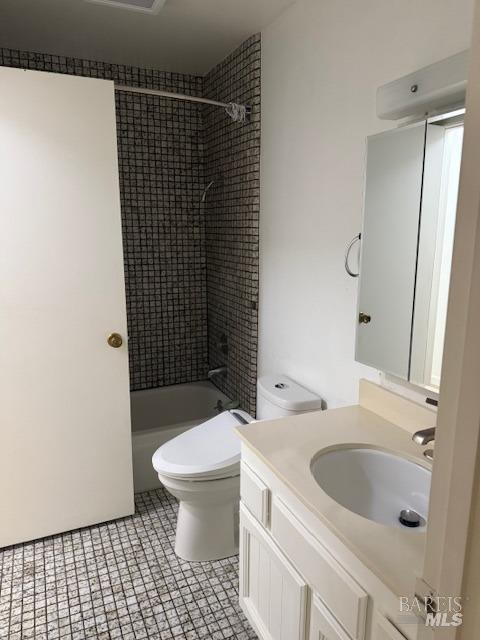 full bath with toilet, bathing tub / shower combination, and vanity
