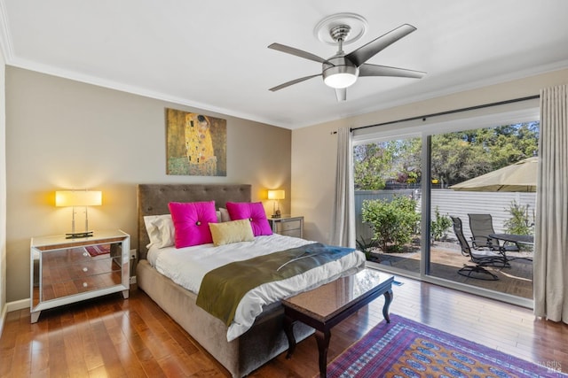 bedroom with crown molding, access to exterior, and hardwood / wood-style flooring