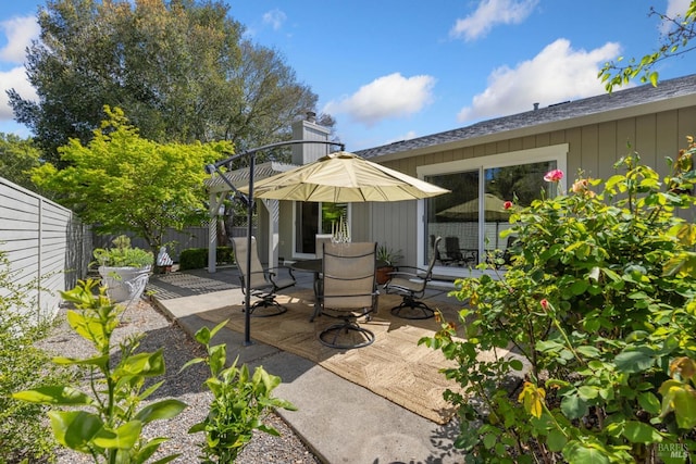 view of patio / terrace with a fenced backyard and outdoor dining area