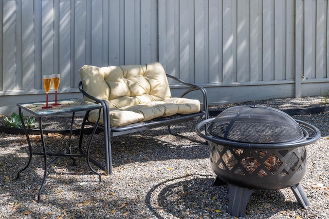 view of patio / terrace with an outdoor fire pit