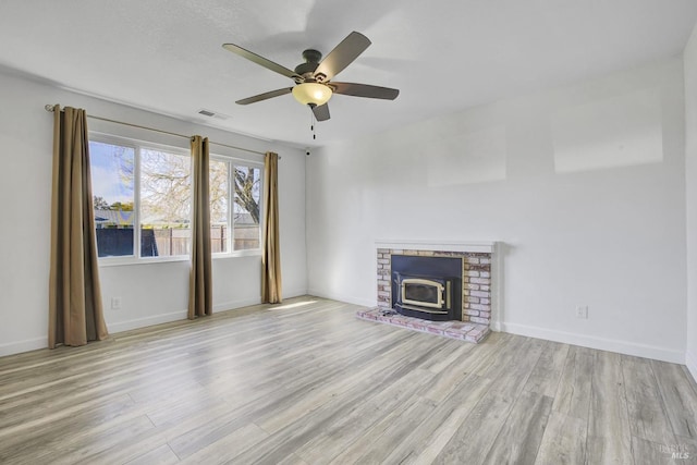 1464 Mcgregor Ave, Petaluma, CA 94954 - unfurnished living room with wood finished floors, a ceiling fan, and baseboards