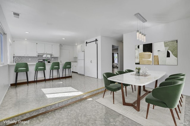 1464 Mcgregor Ave, Petaluma, CA 94954 - dining room with a barn door, baseboards, and recessed lighting
