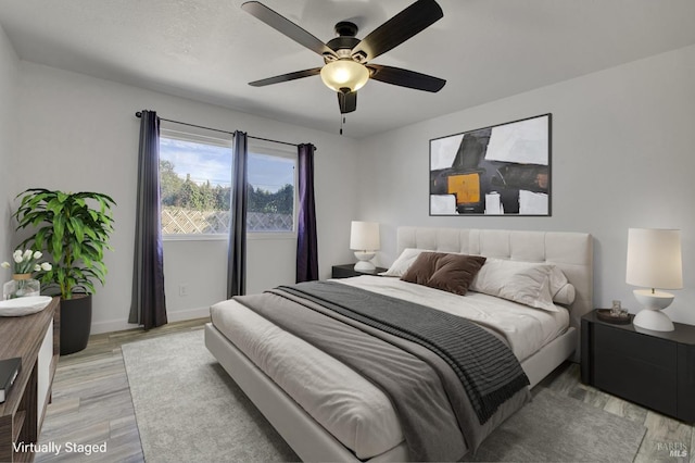 1464 Mcgregor Ave, Petaluma, CA 94954 - bedroom with light wood-style flooring, baseboards, and a ceiling fan