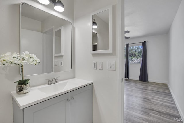 1464 Mcgregor Ave, Petaluma, CA 94954 - bathroom featuring wood finished floors, vanity, and baseboards