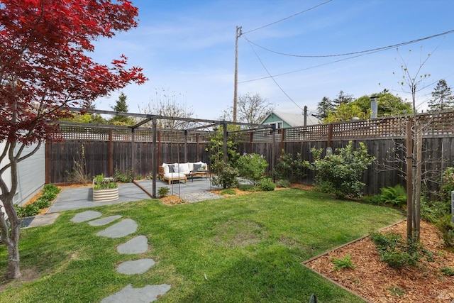 705 5th St, Petaluma, CA 94952 - view of yard featuring outdoor lounge area, a fenced backyard, and a patio area
