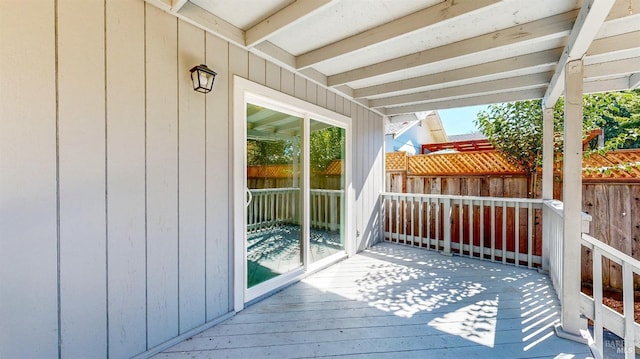 wooden deck featuring fence