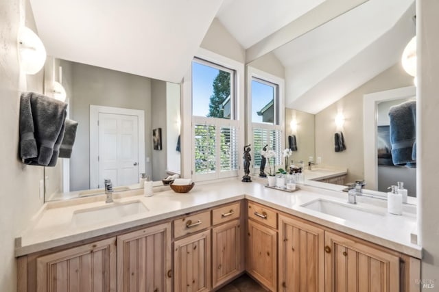 999 Pratt Ave, Saint Helena, CA 94574 - bathroom featuring a healthy amount of sunlight, double vanity, a sink, and lofted ceiling