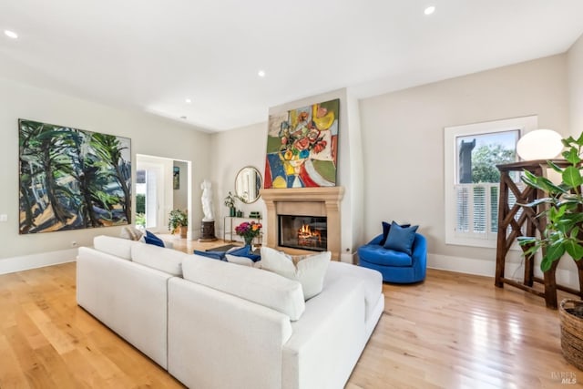999 Pratt Ave, Saint Helena, CA 94574 - living room with a glass covered fireplace, recessed lighting, light wood finished floors, and baseboards