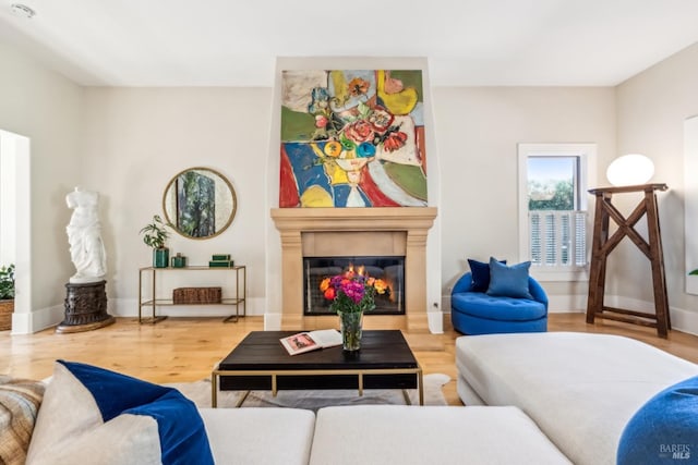 999 Pratt Ave, Saint Helena, CA 94574 - living area with wood finished floors, baseboards, and a glass covered fireplace