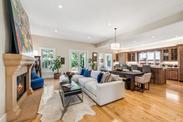999 Pratt Ave, Saint Helena, CA 94574 - living area featuring light wood finished floors, a fireplace, and recessed lighting