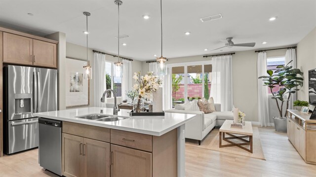 3916 Valance Way, Rancho Cordova, CA 95742 - kitchen with stainless steel appliances, a sink, healthy amount of natural light, light countertops, and recessed lighting
