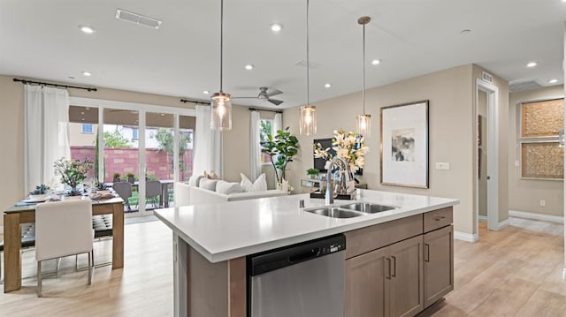 3916 Valance Way, Rancho Cordova, CA 95742 - kitchen with a sink, dishwasher, light countertops, light wood-style flooring, and recessed lighting