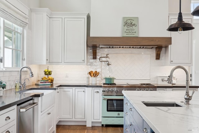 9123 Red Hill Ct, Cotati, CA 94931 - kitchen featuring appliances with stainless steel finishes, backsplash, white cabinets, light stone countertops, and decorative light fixtures