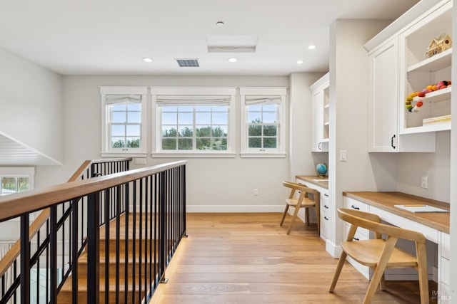 9123 Red Hill Ct, Cotati, CA 94931 - corridor featuring light wood-style floors, an office area, recessed lighting, and an upstairs landing