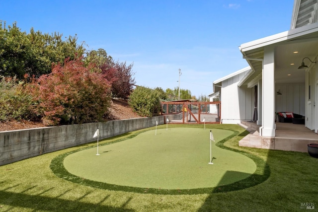 9123 Red Hill Ct, Cotati, CA 94931 - fenced backyard featuring an area to practice putting and a patio