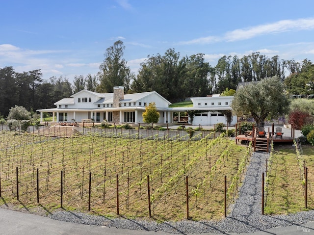 9123 Red Hill Ct, Cotati, CA 94931 - view of front of property with a chimney, a deck, and an attached garage