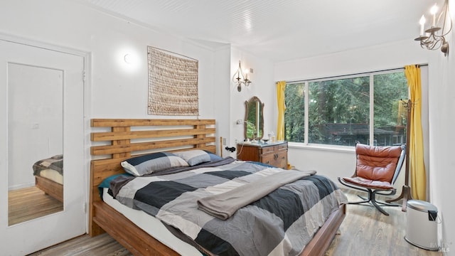 bedroom with wood finished floors