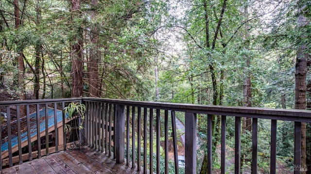 deck with a wooded view