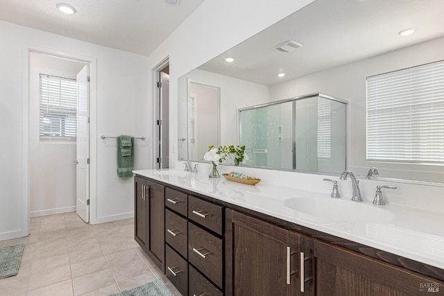 2428 Artisan Way, Fairfield, CA 94533 - full bath with double vanity, a shower stall, baseboards, tile patterned floors, and recessed lighting