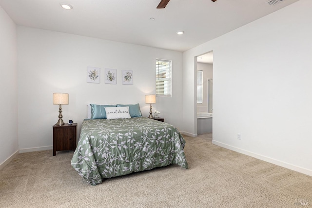bedroom with a ceiling fan, baseboards, ensuite bathroom, carpet flooring, and recessed lighting
