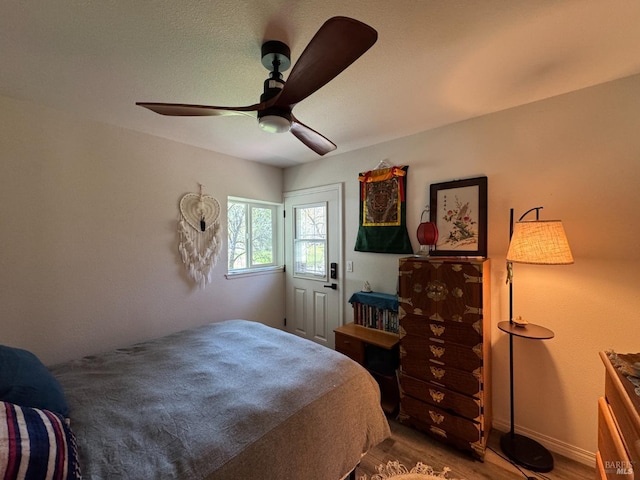 bedroom featuring ceiling fan