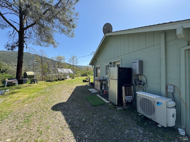 view of yard featuring ac unit
