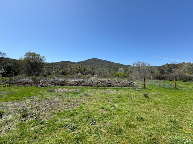 view of mountain feature featuring a rural view