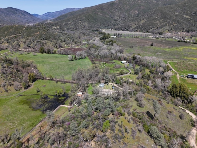 aerial view featuring a rural view and a mountain view