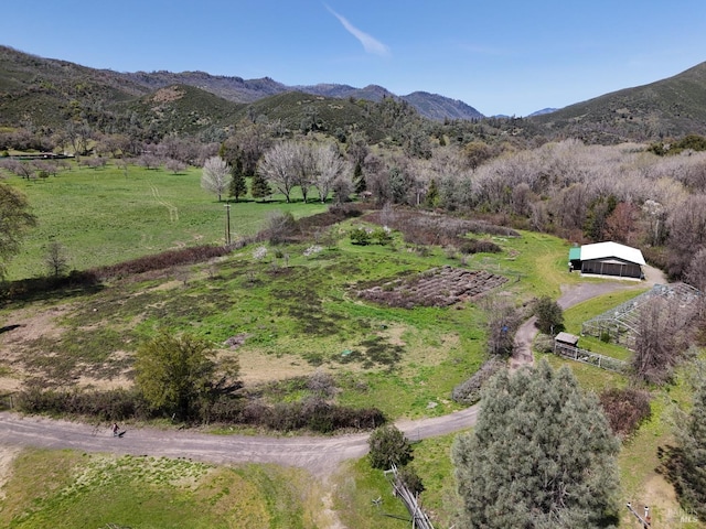mountain view featuring a rural view