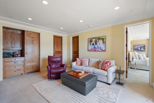 living area with recessed lighting and light colored carpet