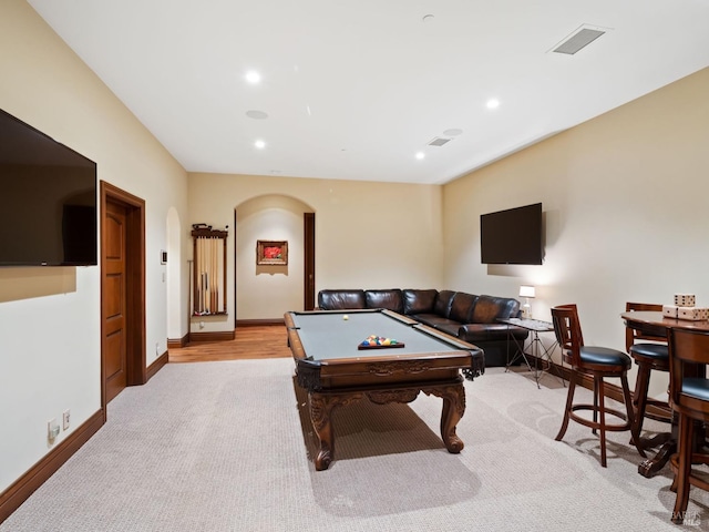 game room with light carpet, arched walkways, recessed lighting, and pool table