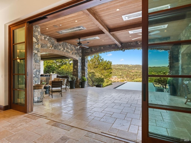 view of patio with ceiling fan and an outdoor hangout area