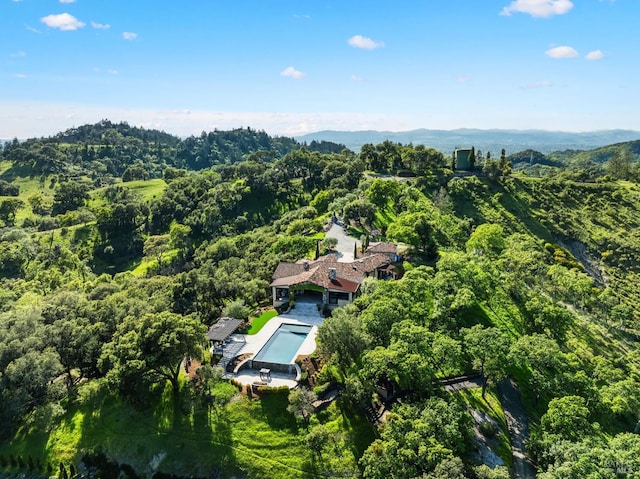 aerial view featuring a forest view