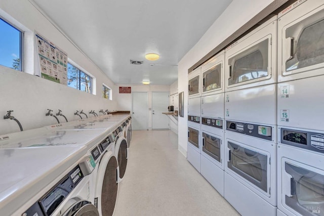 900 Southampton Rd Unit 99, Benicia, CA 94510 - common laundry area with stacked washer / drying machine, independent washer and dryer, and visible vents
