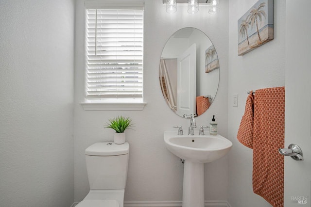 half bathroom with toilet